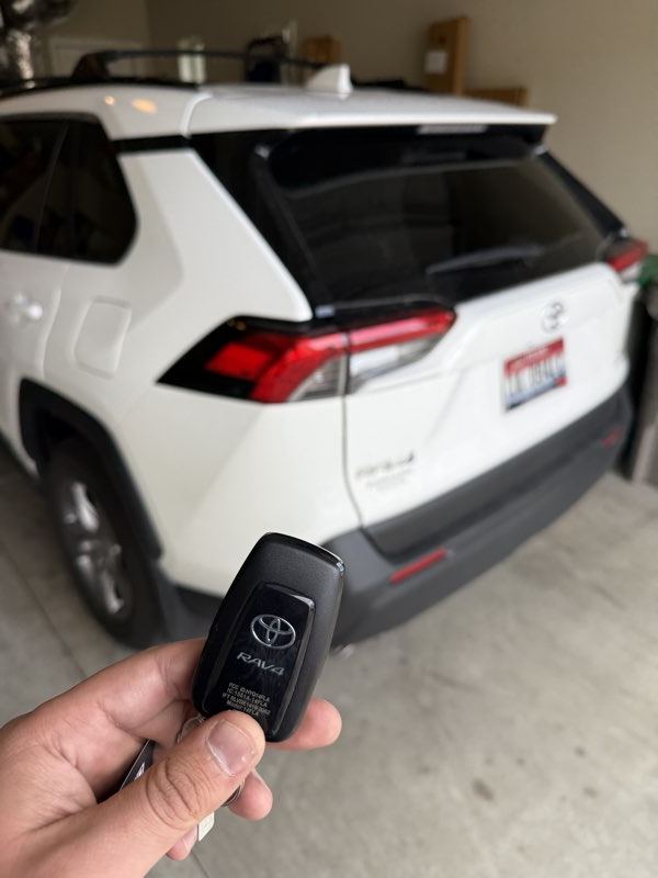 Toyota smart key replacement programmed beside a RAV4 in Boise