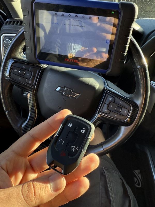Chevrolet key fob programmed on site with a locksmith programming tool